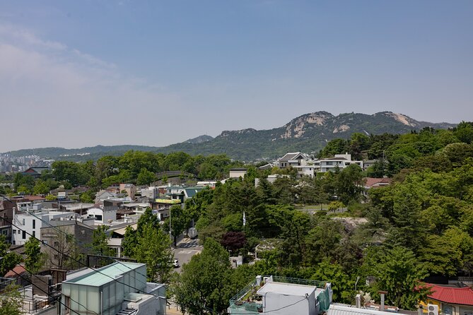 Gwanghwamun Tour l 120 minutes to Understand Local Korean Society - Stop 4: Bukchon Hanok Village and the Fight Between Preservation and Growth