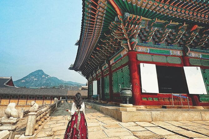 Hanbok Photoshoot and History Tour at Gyeongbokgung Palace - Stop at Gwanghwamun Gate: the classic backdrop, professionally guided