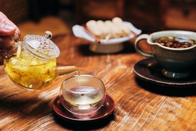 Private Downtown Seoul Food & Market Tour with 8+ Tastings - The hill-top traditional village stop: slower steps, more photo moments