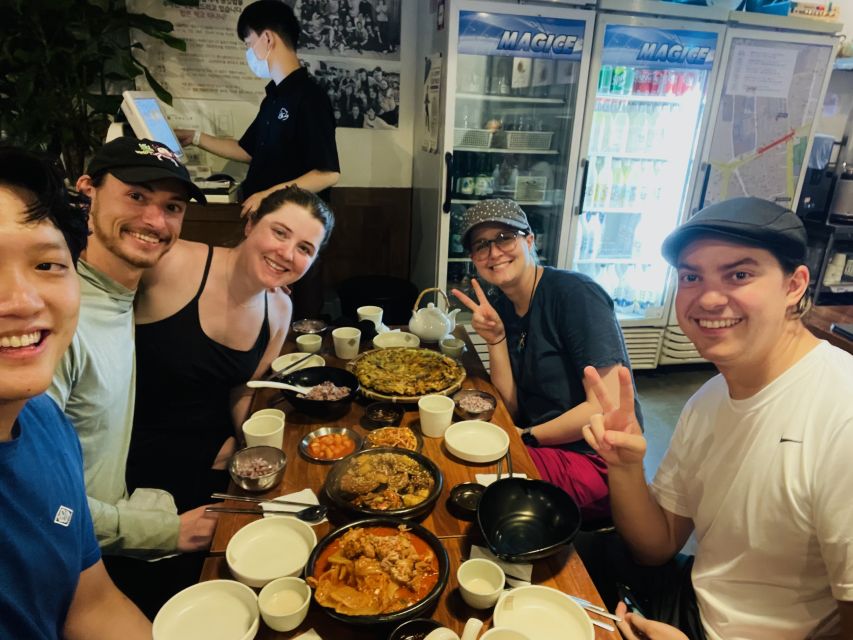 Seoul: Guided City Wall Sunset Hike with Korean Dinner - Naksan Park and Hyehwa: Old wall views plus movie-location clues