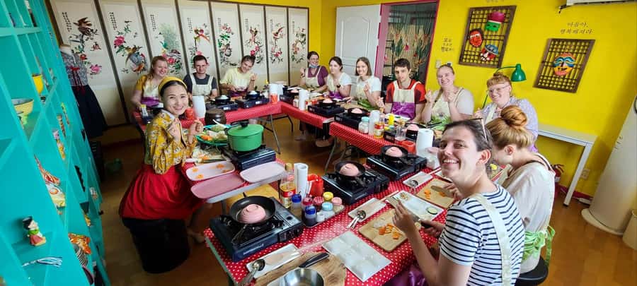Seoul: Korean Cooking Class at a Local Home and Market Tour - Your Four Dishes: Bibimbap, Dakgalbi, Haemul-Pajeon, and Doenjang-Jjigae